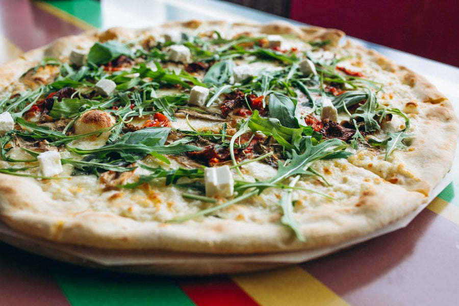 Vegan pizza with multi ingredients by Pizzeria on The Road Sydney